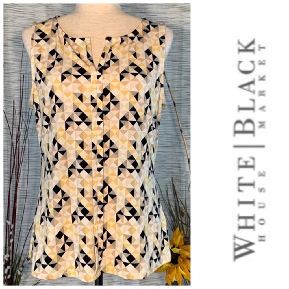 White House Black Market multicolored geometric pullover blouse.